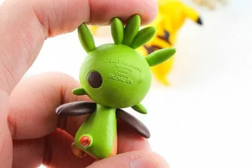 Pkm.store Pokemon Figuren-4 Stk. Pokeball Go / Pokemon Pokebälle